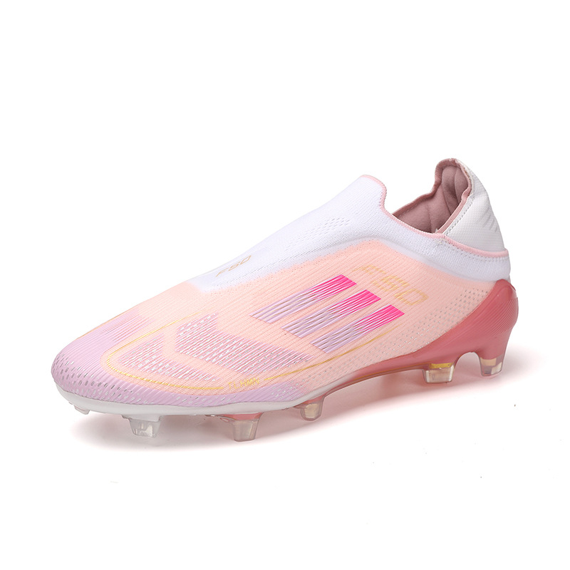 2025 nuevos zapatos de fútbol juveniles antideslizantes para hombres y mujeres de alto nivel AG clavos de hierba niños al por mayor transfronterizos juveniles