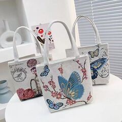 2024アニメジャカード刺繍ファッション文芸キャンバスバッグinsシングル肩百合通勤手提げショッピングバッグ