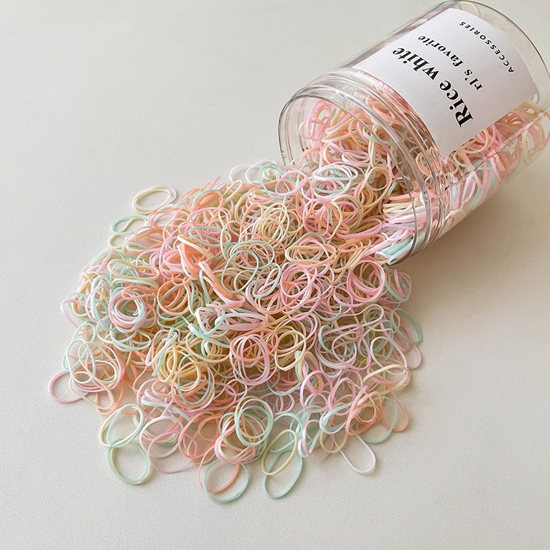 El cabello del bebé está atado, la banda elástica alta, la banda elástica desechable, la trompeta de color para niños no daña el cabello, la banda elástica pequeña