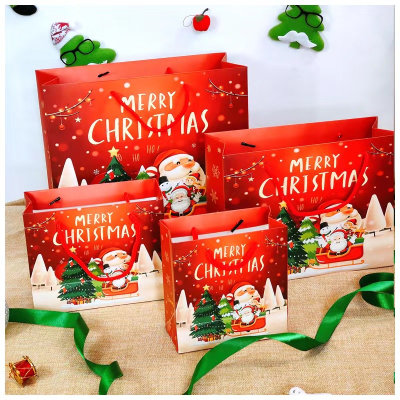 Nueva bolsa de regalo de Navidad bolsa de embalaje de regalo bolsa de papel Lindo bolso rojo de dibujos animados