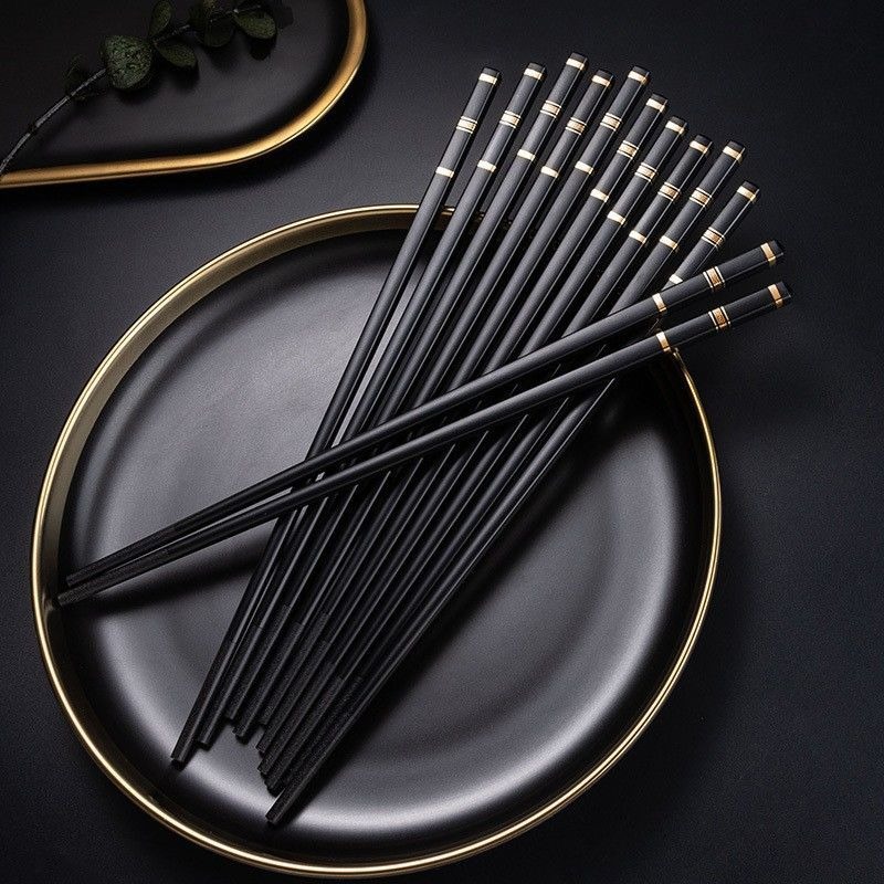 palillos domésticos antideslizantes no es fácil de moldear resistente a altas temperaturas rojo negro de alta apariencia palillos domésticos de lujo ligero 10 pares