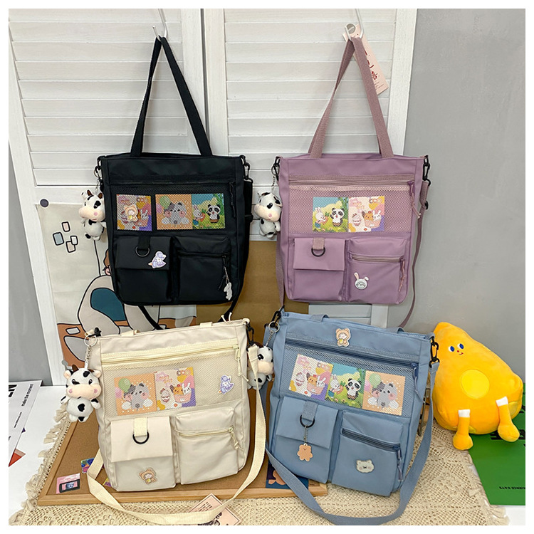 Large-capacity Japanese-style single-shoulder canvas bag for girls, versatile crossbody, ins, a tote bag for junior high school students' classes, and a schoolbag for after-school tutoring undefined