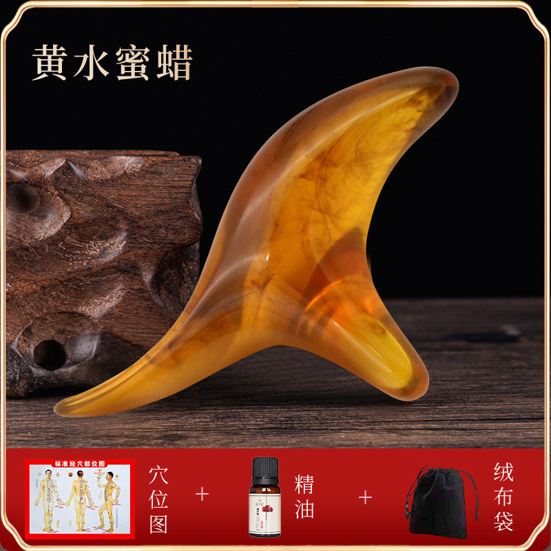 檀木の三角すずめのマッサージ器の蜜ろうの香木の筋の経絡の錐は足の底のツボの足を押してマッサージして穴の棒をつけます。