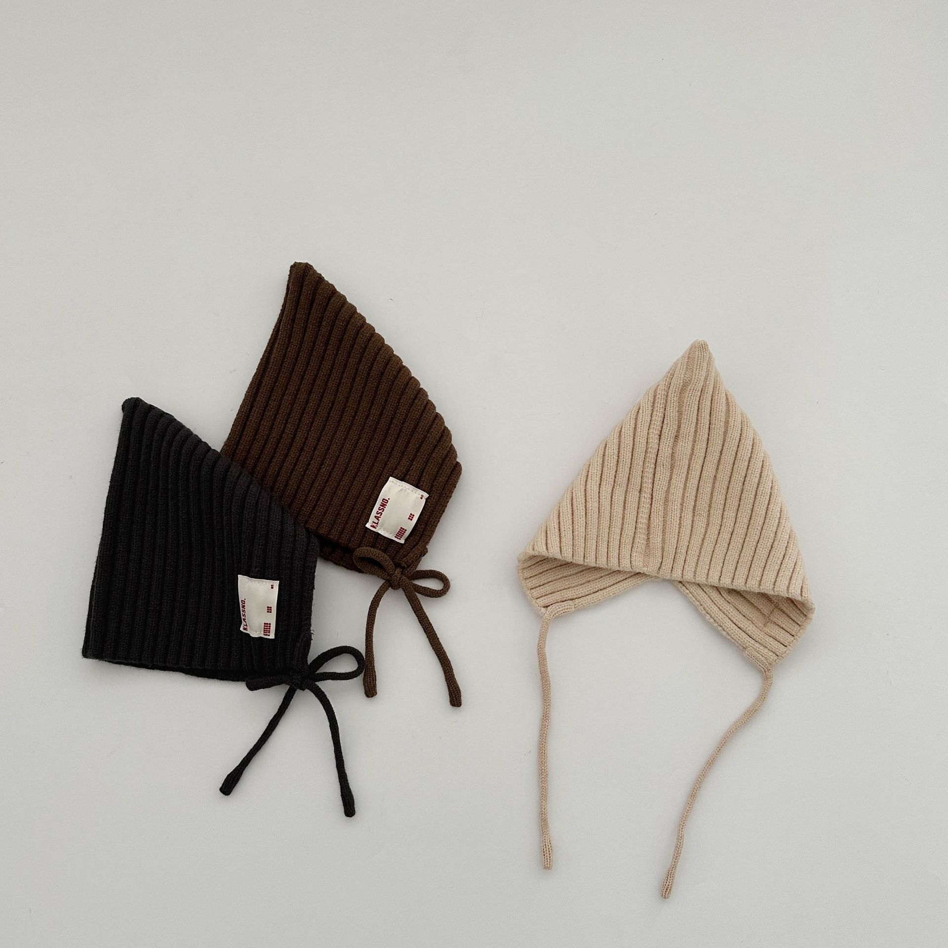 ins sombrero para bebés coreanos otoño y invierno caliente a prueba de viento gorra de punto para niños y niñas recién nacidos correa gorra de bolso