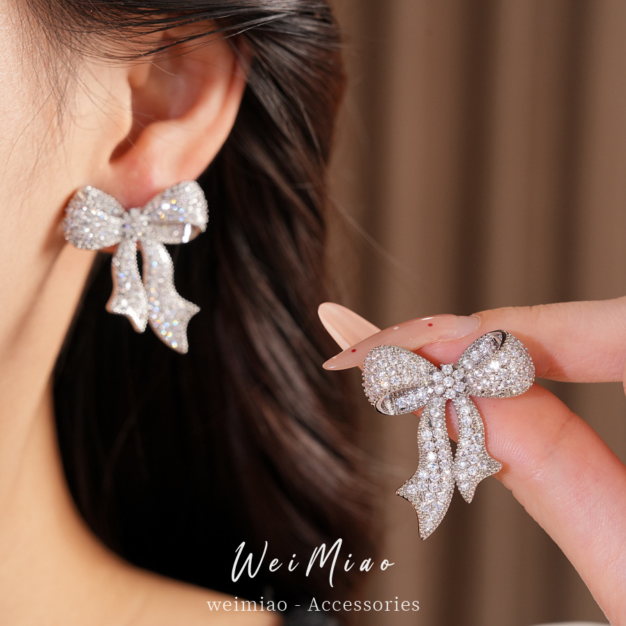 Agujas de plata de piedra de arco pernos de estilo europeo y americano personalidad temperamento nicho pendientes ligeros de lujo alta sensación de auriculares al por mayor image 3