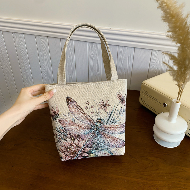 新しいファッショナブルで多用途なカジュアルな気質の女性のキャンバス両面ゴールデンシルクジャカード刺繍蝶ハンドバッグママバッグ|undefined