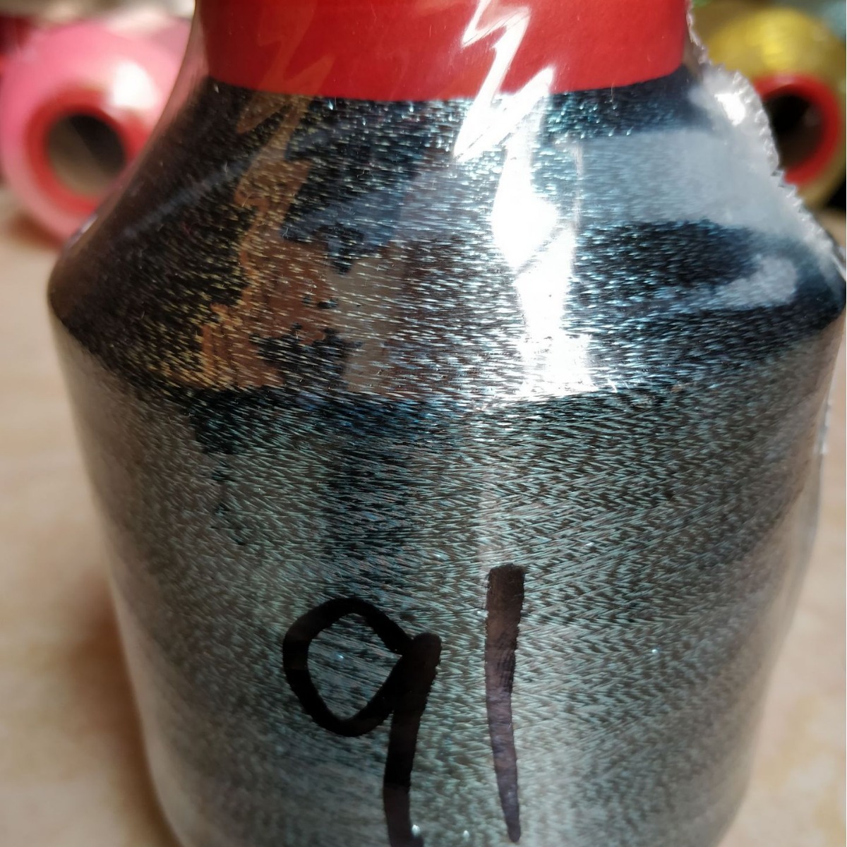 2股150D涤纶单丝捻金丝复合铜黑线捻淡紫箔丝AB彩丝线织片子下摆