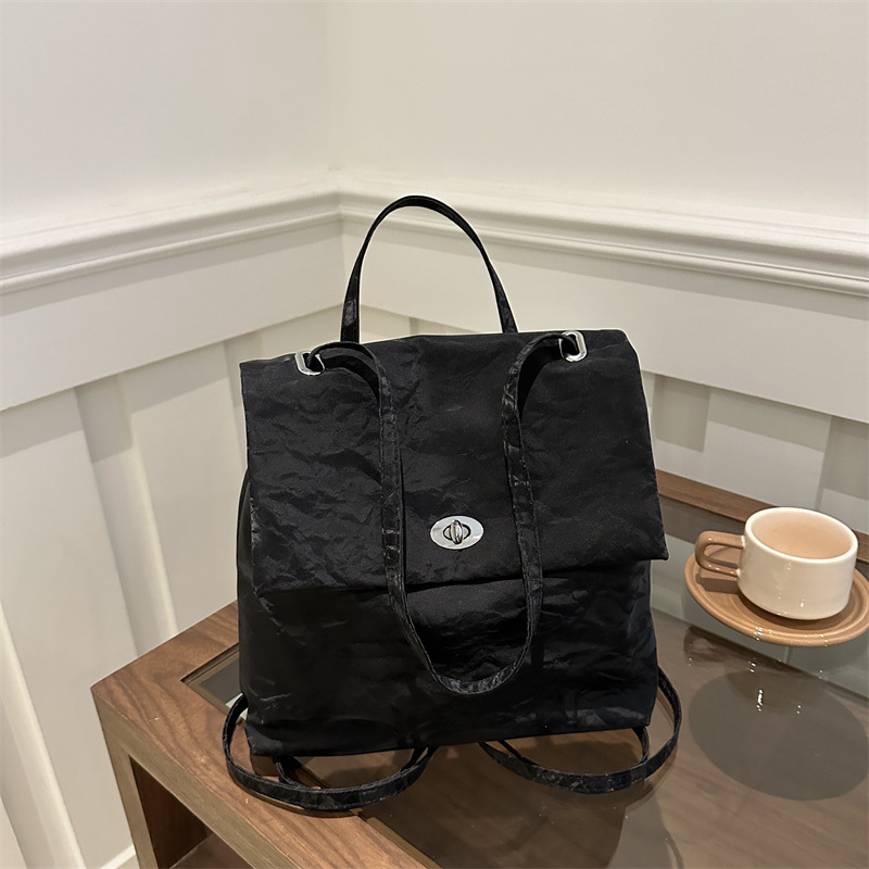 Mochila de moda coreana para mujeres 2024 verano nuevo estilo simple ocio de gran capacidad versátil mochila corta