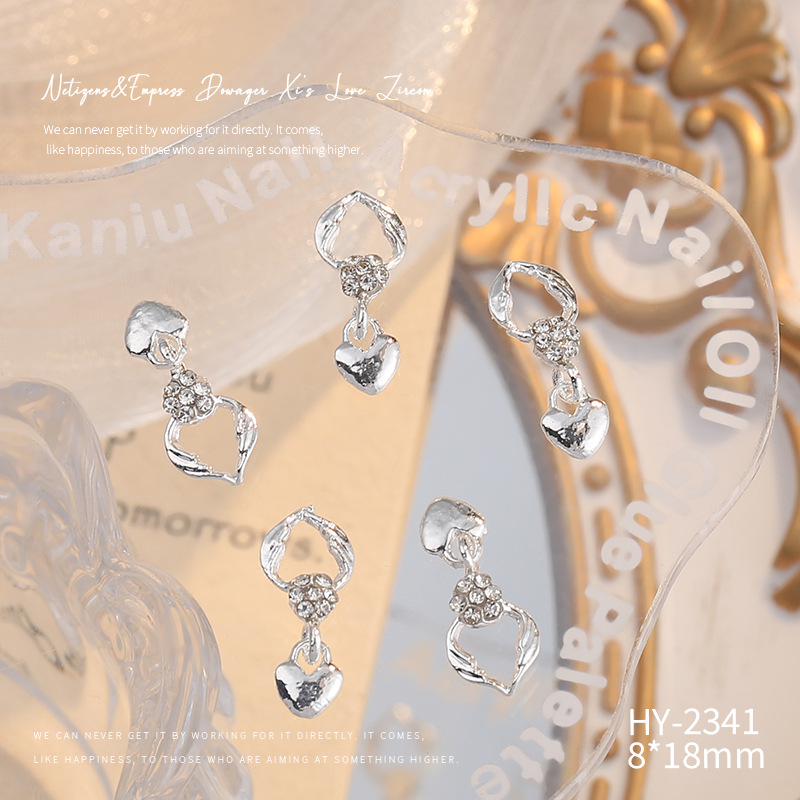 Nueva joyería de aleación de manicura completa diamante borla arco corona plata uñas manicura joyería accesorios al por mayor