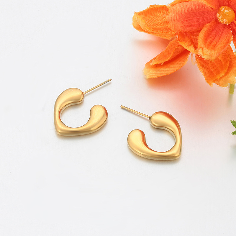 Xuping Europa y los Estados Unidos transfronterizos de acero inoxidable 14k pendientes de color simple brillante irregular pendientes de geometría personales al por mayor mujeres
