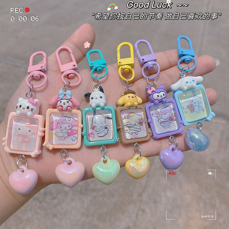In the photo, Sanlio Keychain Macaron Color Girl Heart Pendant School Gift for Girlfriends Hanging Ornaments