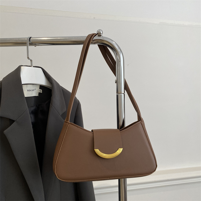 Textura de moda casual bolso bajo 2025, principios de primavera nueva personalidad ins bolso de hombro de aire extranjero, textura de moda bolso de mochila