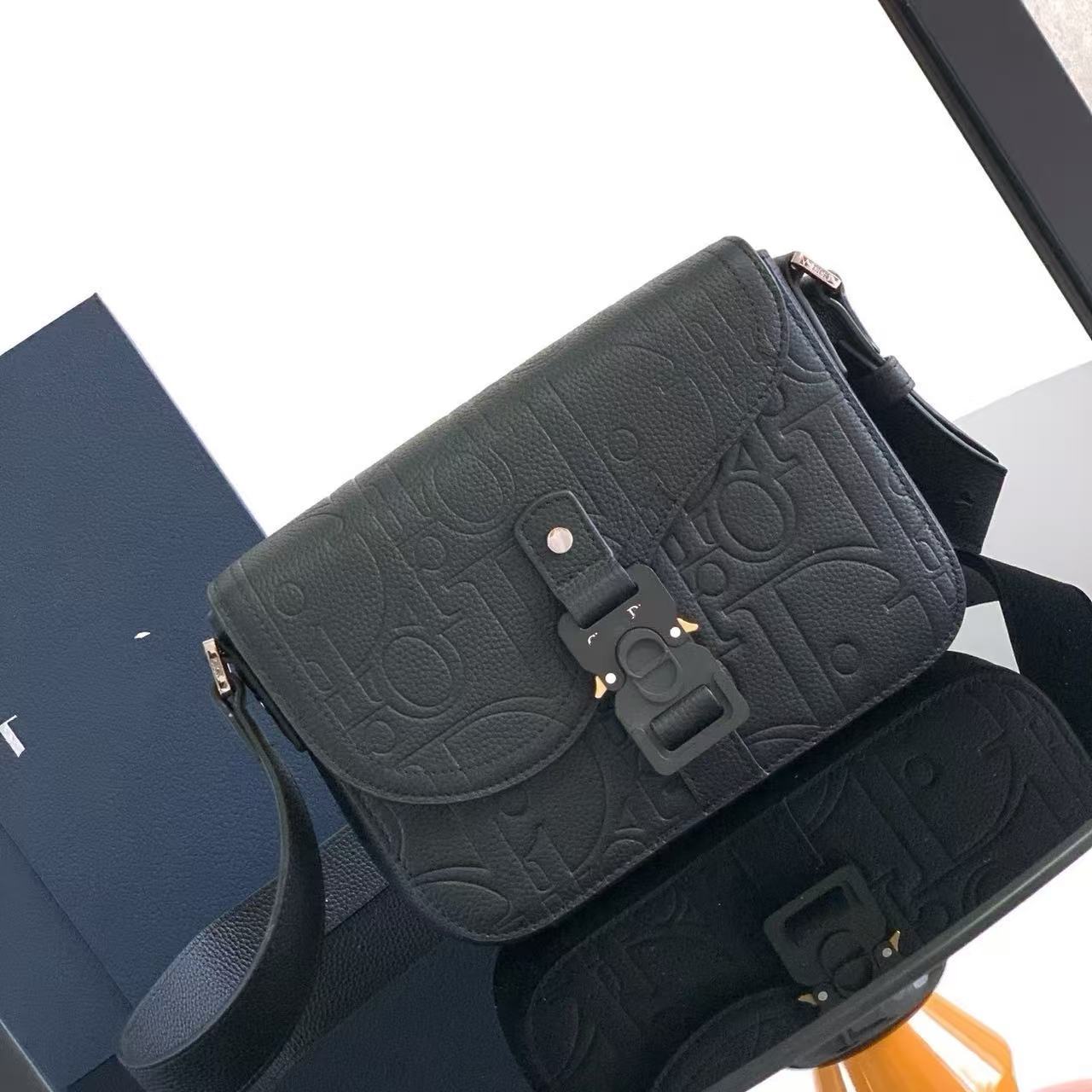 Black embossed postman