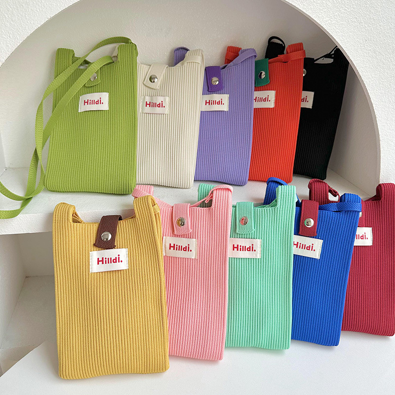 Primavera nuevo color sólido de punto de hombro mochila bolso móvil de moda versátil bolso de dopamina para hombres y mujeres
