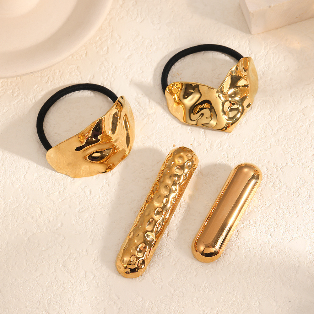 Europa y los Estados Unidos viento metal de acero inoxidable clip de cabello para la cabeza de la mujer de alta calidad sensación de disco de cabello duradero un clip de cabello conjunto de cuerda de cabello