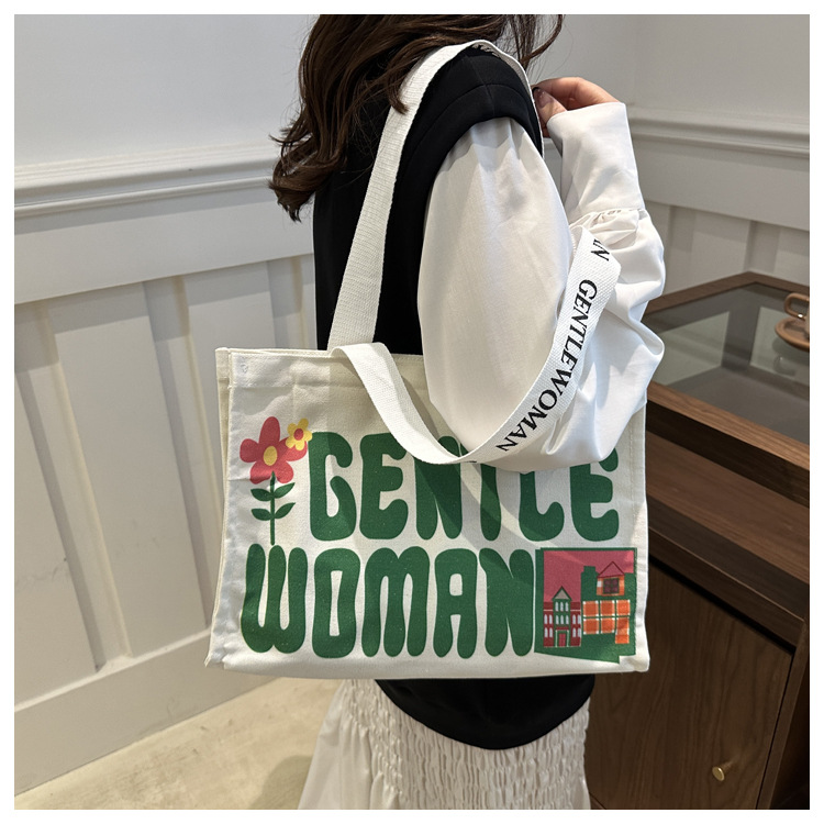 Large-capacity letter canvas bag 2025 new style ins printed versatile shoulder bag for commuting and portable ladies' tote bag undefined