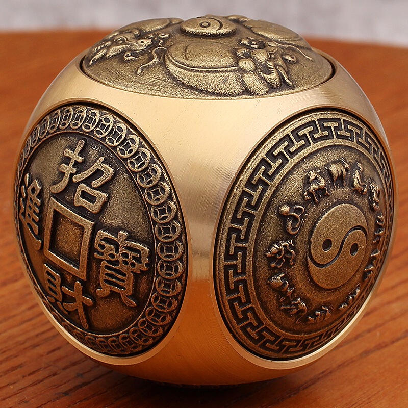 Brass six-sided rotating ball-shaped fidget toy featuring the twelve zodiac animals and the bull, designed to bring good fortune and relieve stress Brass six-sided rotating ball-shaped fidget toy featuring the twelve zodiac animals and the bull, designed to bring good fortune and relieve stress