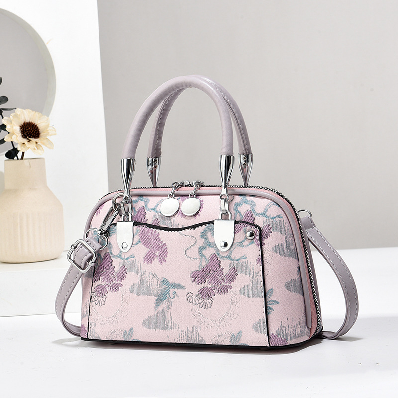 Fabricantes de bolsos de mujer bolsos de mano atmósfera textura bolsos de hombro de gran capacidad bolsos de mochilas bolsos de comercio exterior