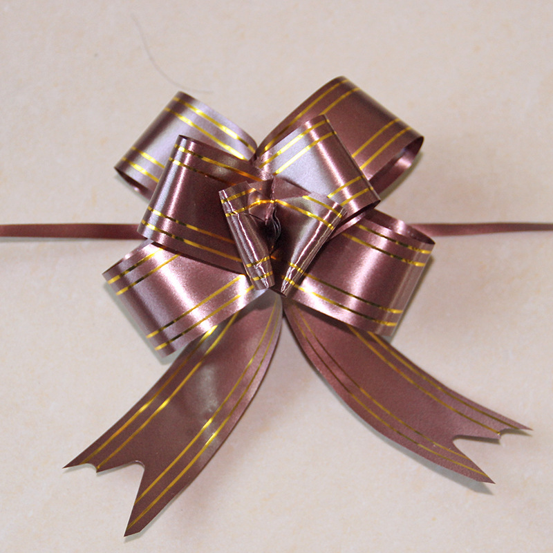 Fabricante al por mayor de empaques de flores para regalos navideños, cinta con borde dorado, 30 flores medianas atadas a mano.