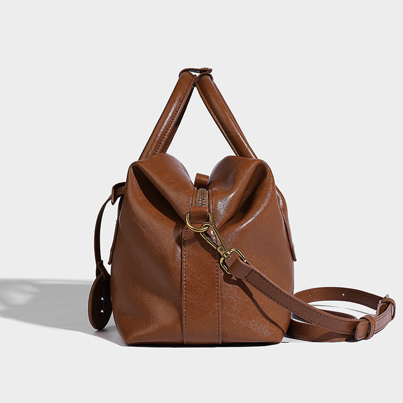 Bolsos de Boston de piel bronceada vegetal retro bolsos de bolera portátiles bolsos de mujer otoño e invierno 2024 nuevos bolsos de Usnea de hombro único