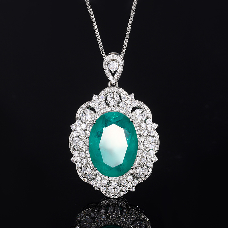 2024 nueva joyería Zhuang Shengsheng fondo de cobre chapado en oro simulación corindón rojo cristal puntiagudo azul colgante de lujo ligero mujer 15*20