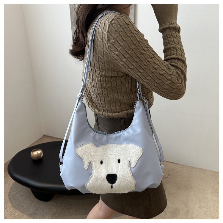 The new autumn and winter 2024 fashion cartoon backpack with simple, individual and niche design, single-shoulder bag and commuter tote bag undefined