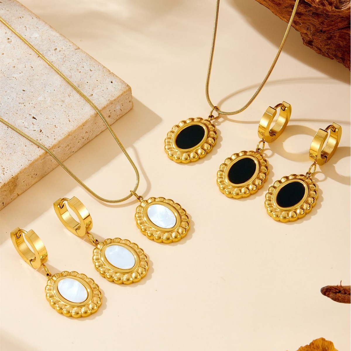 Francés ligero lujo nicho diseño sensación de pendientes retro no desvanecido collar de frita de titanio acero joyas de mujer clavícula cadena de suéter