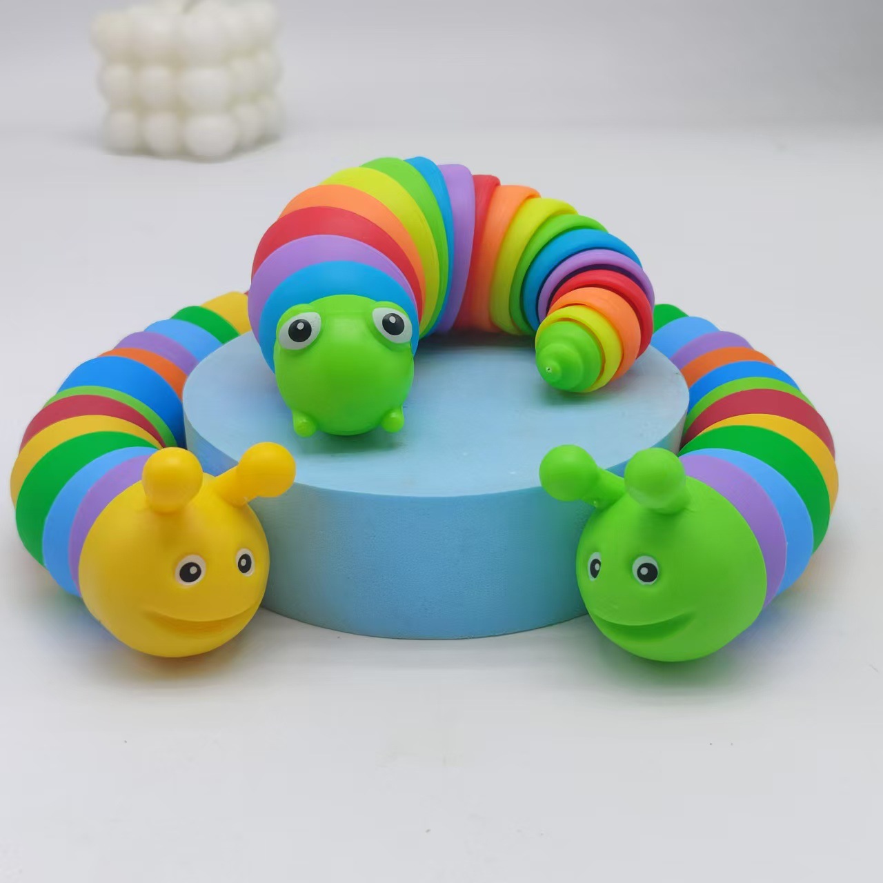 Explosiones transfronterizas simulación descomprimida arco iris sonriente nariz oruga peristáltica puzzles pequeños juguetes para niños animales mayoristas