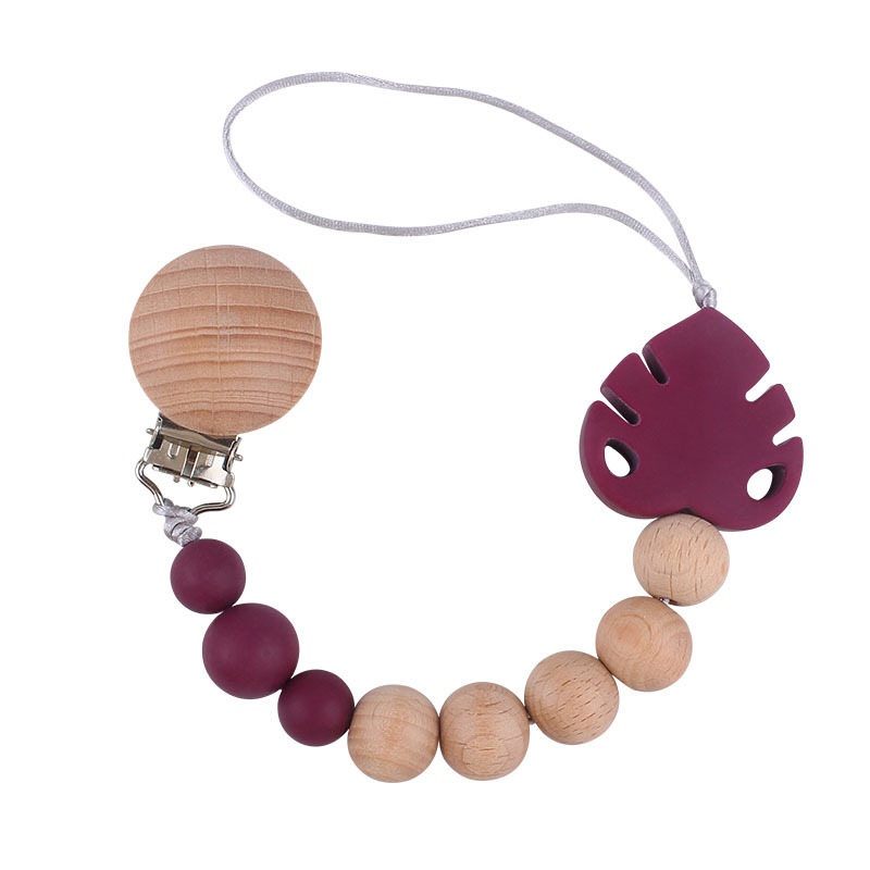 Suministros para bebés creativo haya chupete clip molar juguete mordedor bebé hoja de silicona chupete cadena anti-caída de la cadena