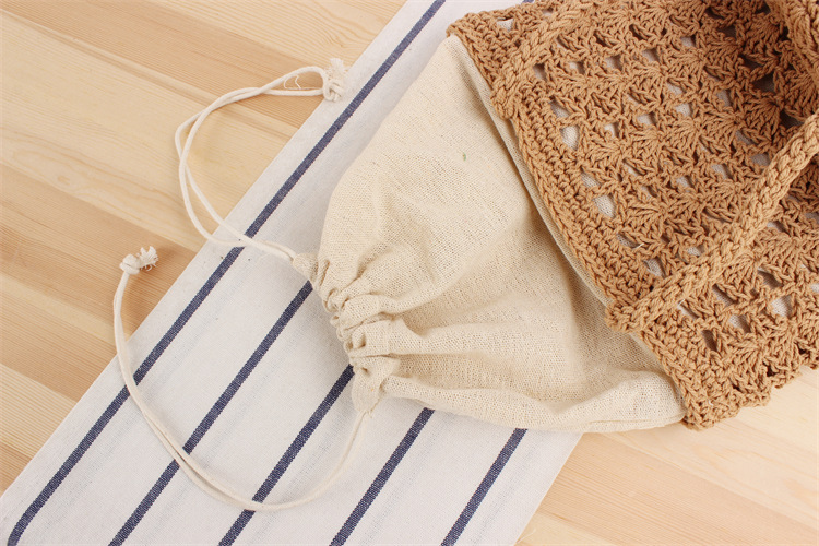 Women's Medium Cotton Rope Solid Color Vacation Beach Weave Bucket String Straw Bag display picture 10
