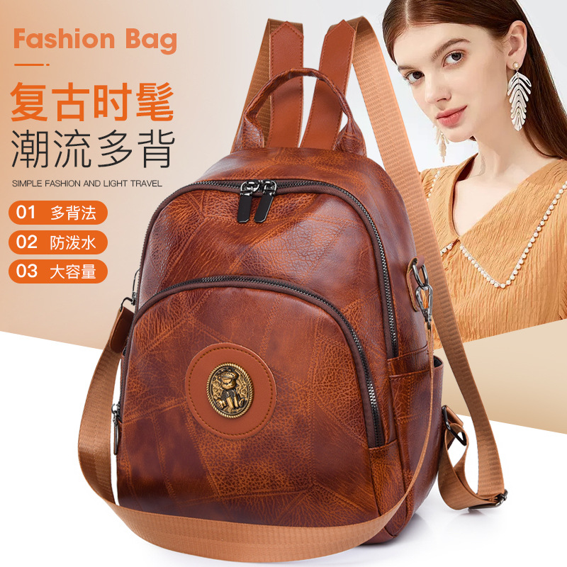 2024 nueva mochila retro bolsa de mujer de moda estilo coreano de cuero suave mochila de mujer de gran capacidad de moda bolsa de viaje de todo fósforo