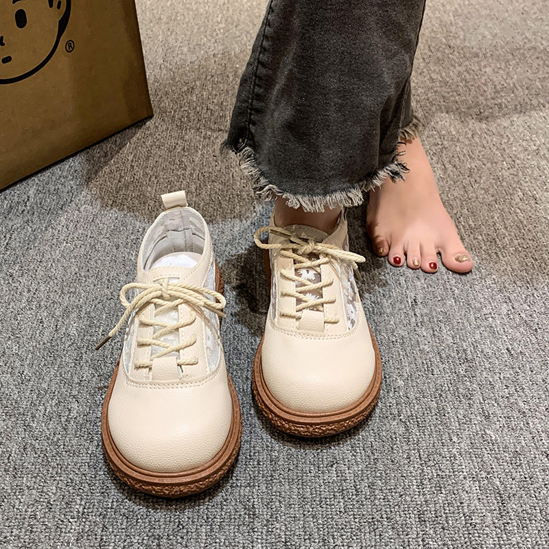 Zapatos de mujer de verano nuevos zapatos de mujer Soren estilo literario sandalias huecas de fondo grueso cabeza redonda encaje zapatos muñeca transpirables