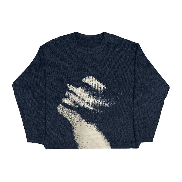 Elegant demi-season knitted sweater with a round collar