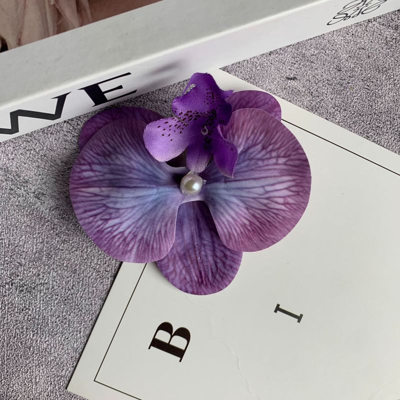 絹布の胡蝶蘭の花の頭は花の壁の部品の花の材料の頭をシミュレーションして髪を飾ってdiyの手作りの結婚祝いの贈り物を挟んで造花を飾ります。|undefined