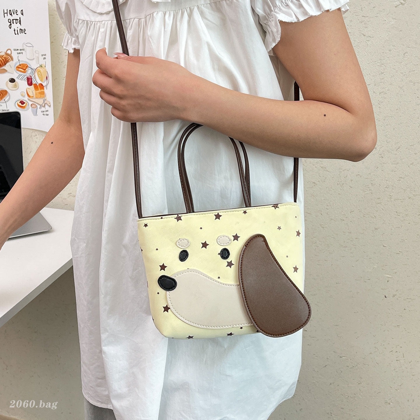 Estrellas de gran capacidad de dibujos animados temperamento perro nuevo diseño nicho mochila 2026 versión coreana de mujeres viajeros
