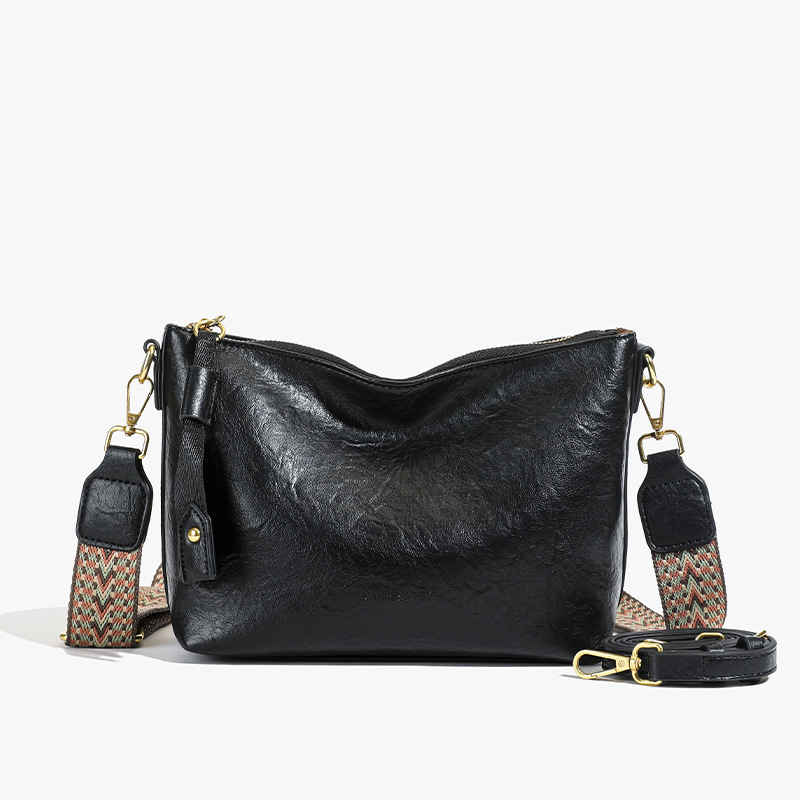 Bolsa de alta sensación de comercio exterior para mujeres 2025 nueva moda simple bolso de hombro de viaje casual bolso de cubo de agua