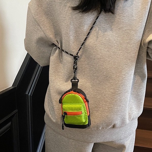 Mini children's bag, 2025 new color-block student shoulder bag, crossbody bag, lightweight earphone storage bag, backpack, charm bag