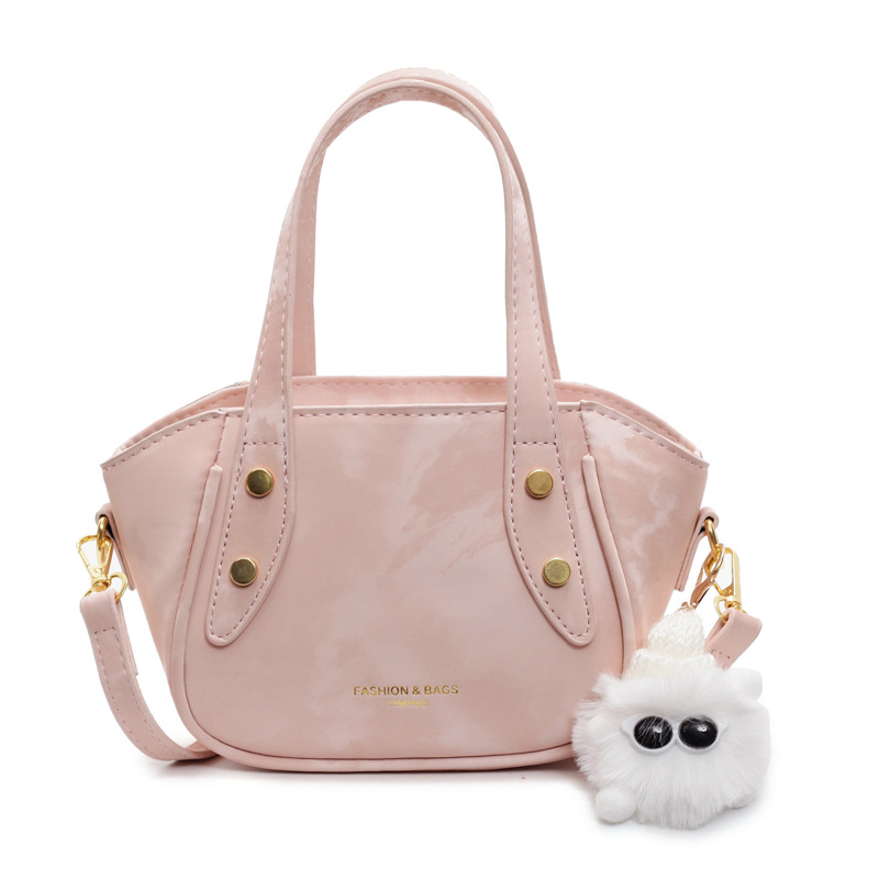 Nicho de diseño de tendencia bolso de cubo de mano mujer 2025 nueva moda bolso de hombro de estilo extranjero para trabajar bolso de transporte