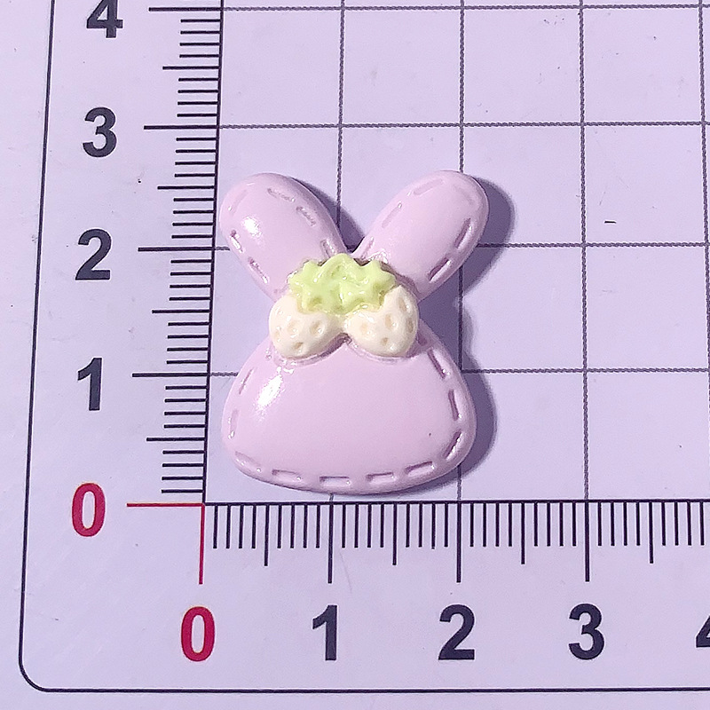 Nuevo color caramelo lindo conejo DIY accesorios de resina crema pegamento para el cabello accesorios para el cabello agujero abrazadera de zapatos agujero material hecho a mano