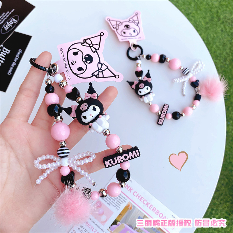 サンリオのクロミの灰色の玉のチェーンのキーホルダーのかわいい少女の心の携帯電話のペンダントの美楽のティの公の子のカバンのペンダント|undefined