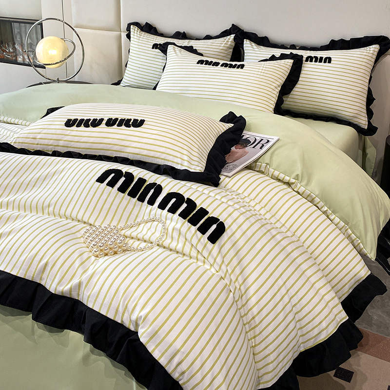 2024 nuevo estilo francés pequeño bordado de toalla de fragancia cuatro piezas funda de edredón sábana simple ropa de cama Nantong al por mayor