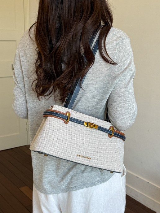 Textura de lino simple versátil alta sensación bolso de hombro de nicho para mujeres de diseño de viaje al trabajo bolsa de ocio