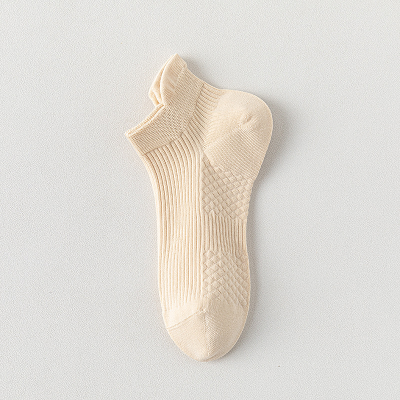 Calcetines de barco para mujeres, calcetines de primavera y verano, calcetines de algodón de color sólido, calcetines de algodón resistentes a las bolas, calcetines de embalaje independientes sin costuras.