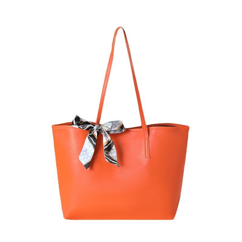 Bolsa de moda de comercio exterior simple y de gran capacidad 2024, nueva pañuelo de seda litchi decorado bolso de hombro de mujer de color sólido