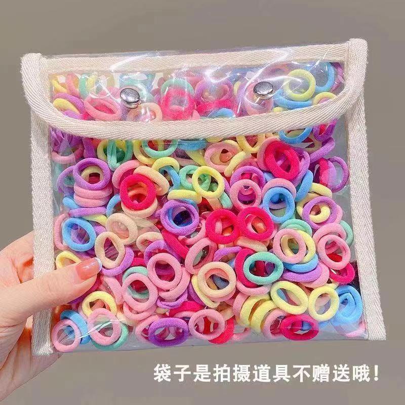 Color de caramelo de alta elasticidad pequeña toalla anillo de cabello bebé anillo de cabello no daña cabello atado fábrica de cabello al por mayor