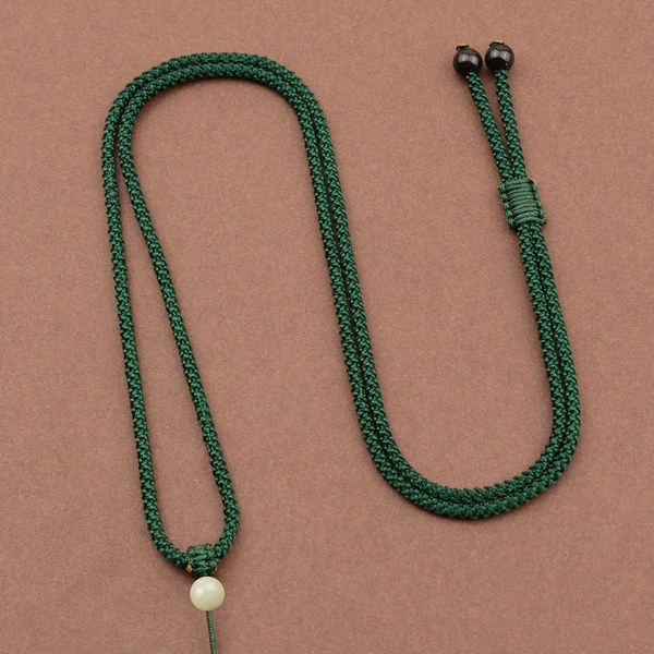 Dark green/jade top beads/up and down adjustment