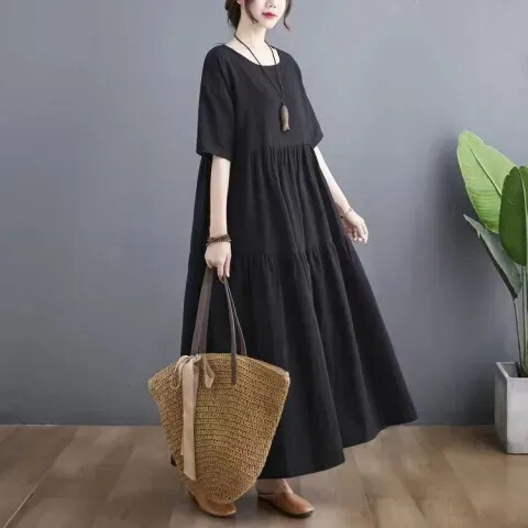 Summer fashion, artistic design for plus-size women: Large-size cotton-linen short-sleeve dress with paneling—perfect for hiding belly area, creating a slimming effect, and offering a relaxed, flowy silhouette.