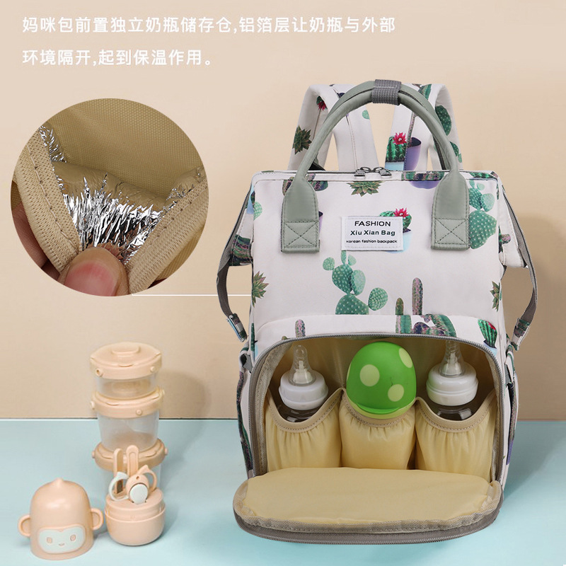 Multifuncional nueva bolsa de mamá puede colgar cochecito de aluminio aislamiento bolsa de madre y bebé anti-derramamiento multiuso mochila