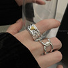 Retro fashionable ring, silver 925 sample, on index finger