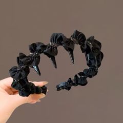森系仙美黒巻き布芸カチューシャ女性2025新型気質高級感圧髪歯付き滑り止めカチューシャ